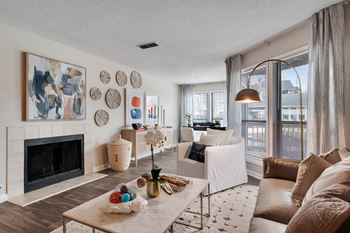 The arbors at breckinridge apartment homes spacious living room with fireplace